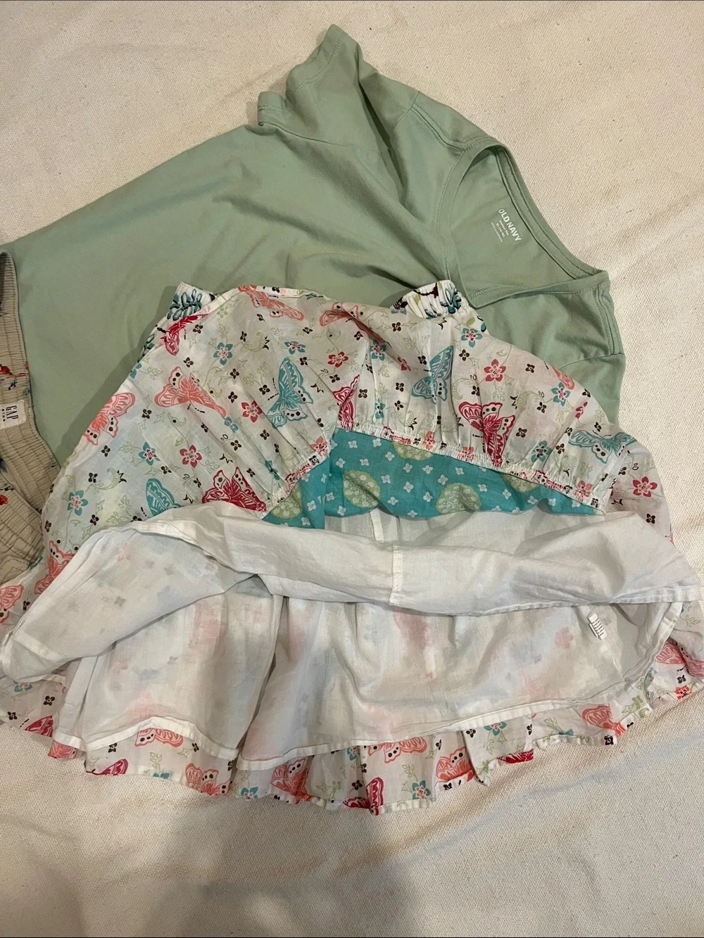 This is a cute combination of 14-16 and large little girls summer wear.